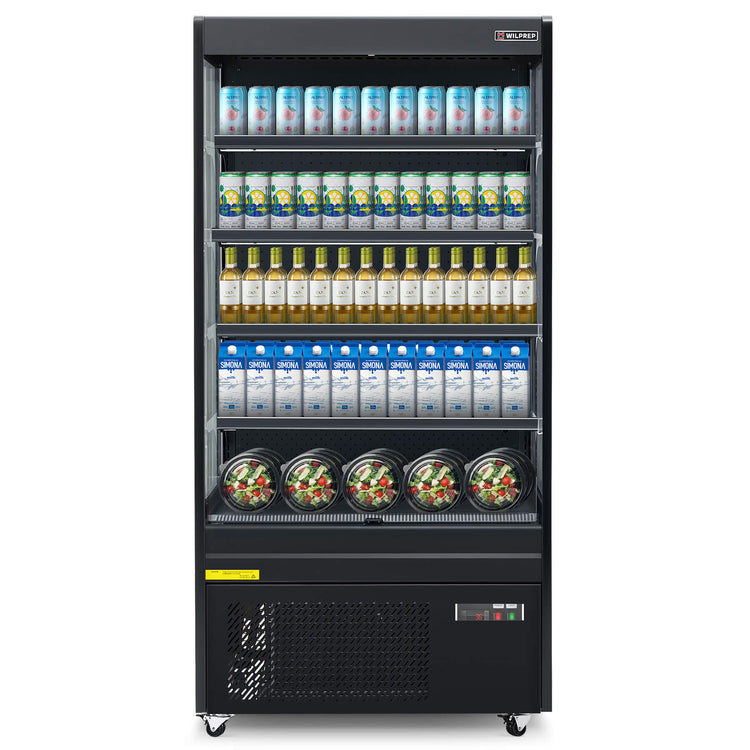 A black vertical air curtain merchandiser with LED-lit shelves displaying bottled beverages and packaged snacks.