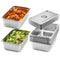 Stacked stainless steel hotel pans with lids, some filled with food.