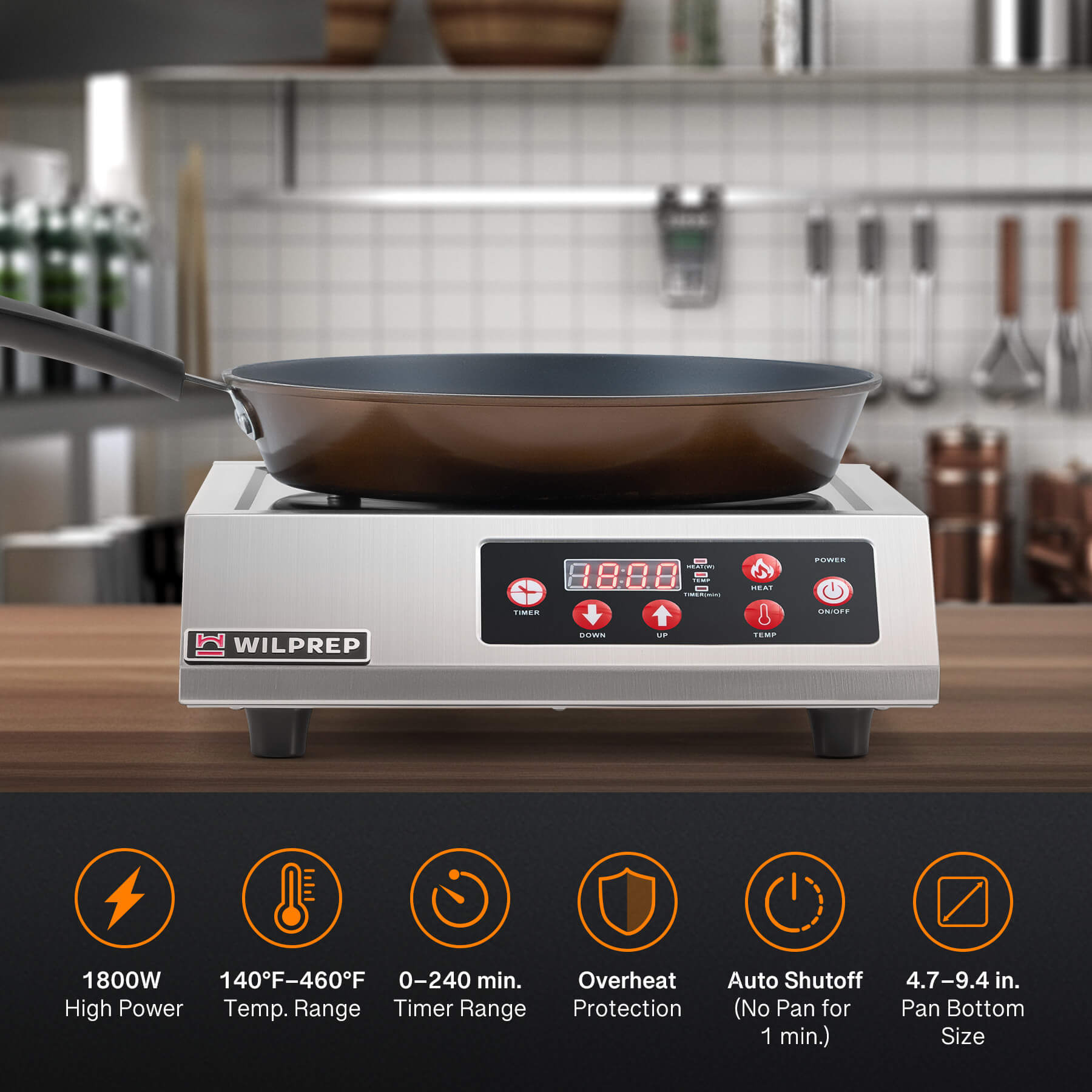 A silver-colored commercial countertop induction range with digital control displayed on the front panel.