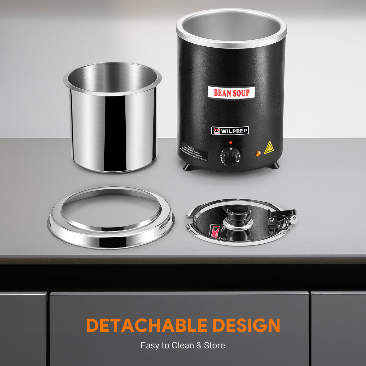 A black commercial soup kettle warmer with a detachable lid and a stainless steel interior. It has a control knob on the front and is designed for warming soups and sauces.