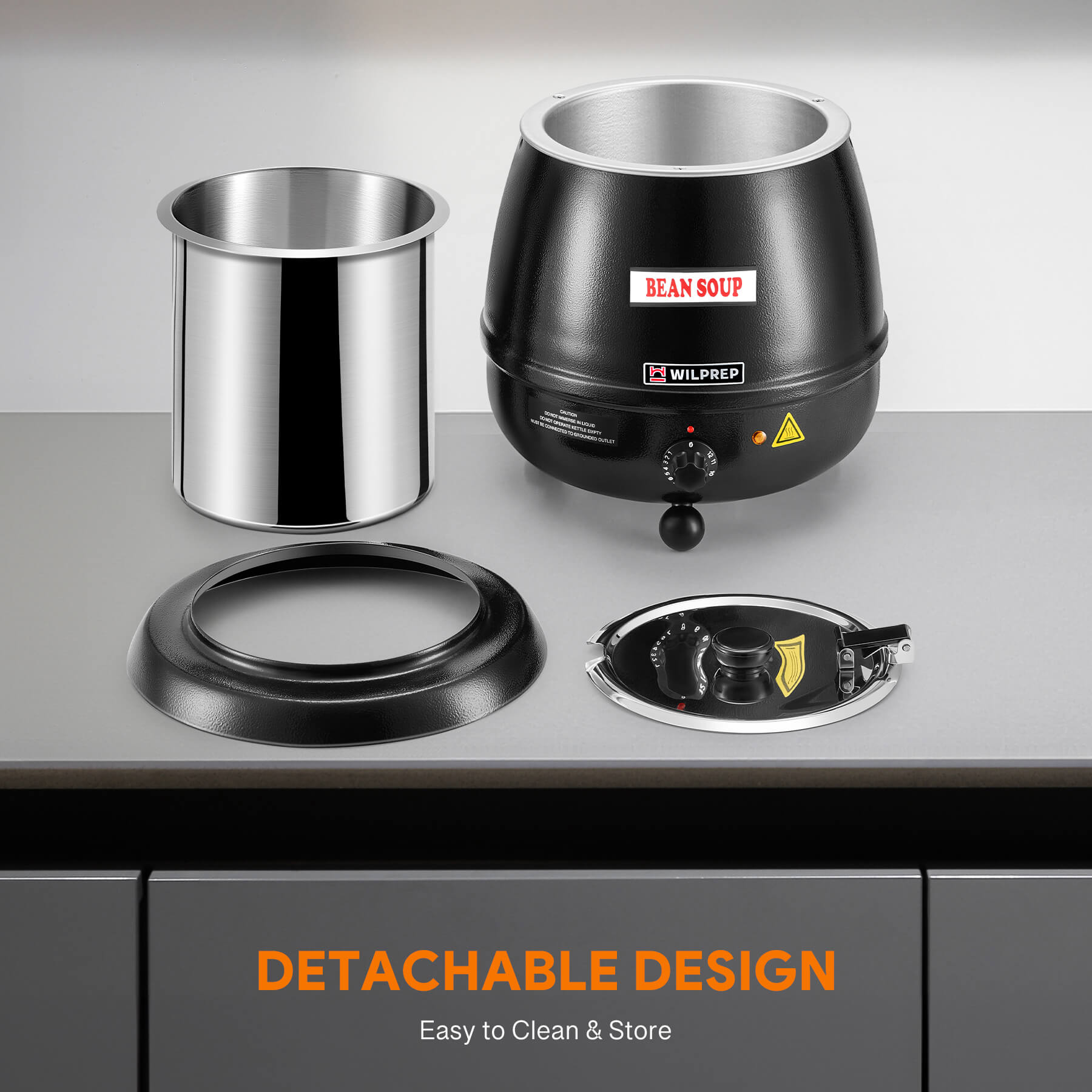 A black commercial soup kettle warmer with a detachable lid and temperature control knob, with a label showing 'BEAN SOUP' on the front.