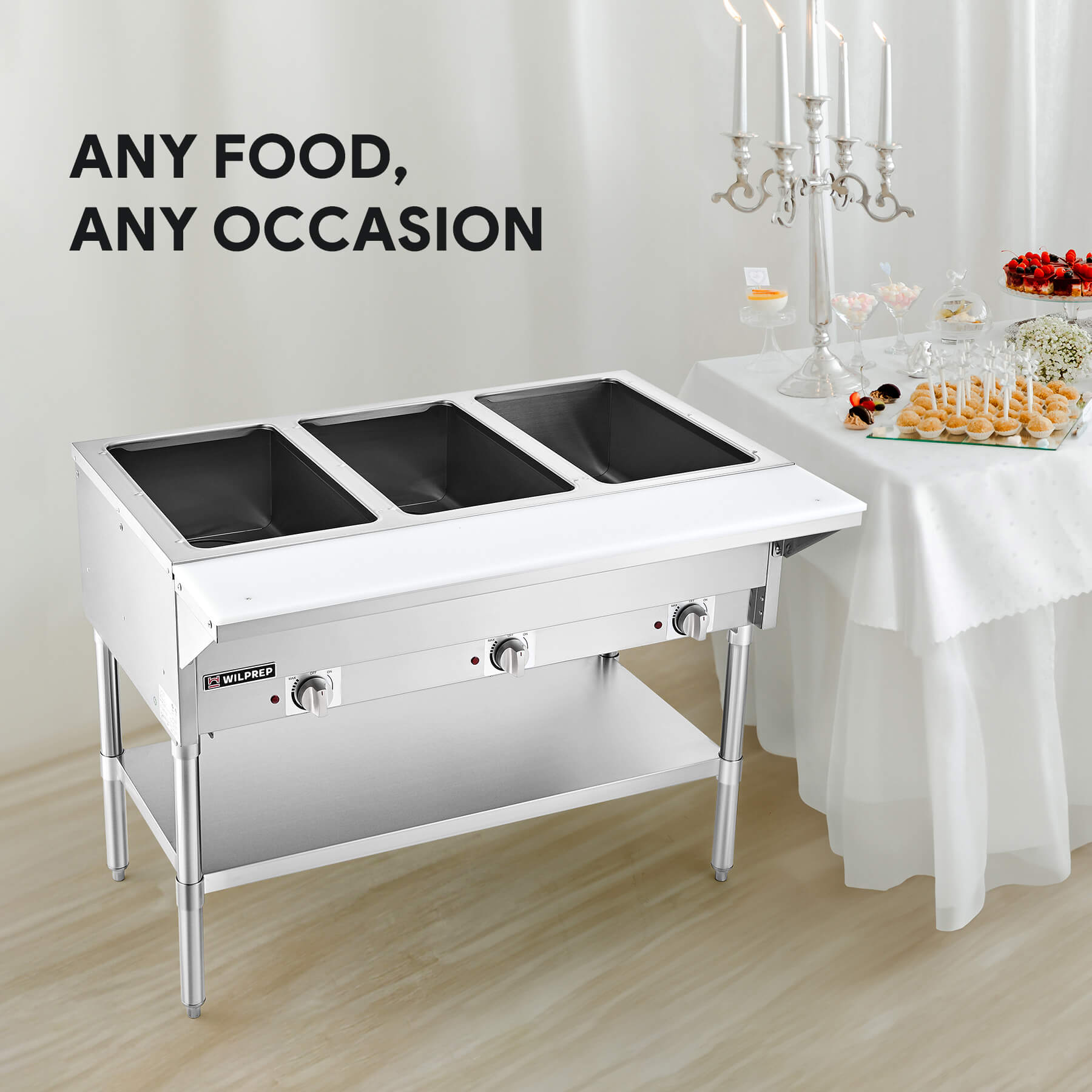 A silver-colored 3 well electric steam table with a storage shelf beneath, featuring control knobs on the front and a clear glass sneeze guard.