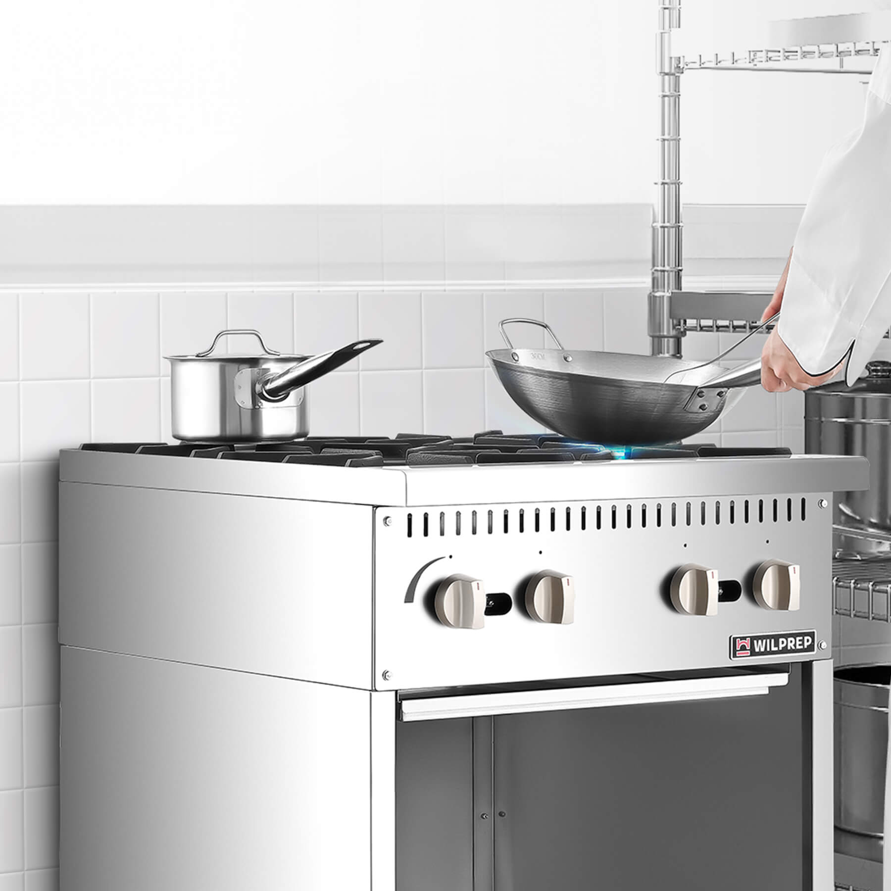 A 24 inch 4-burner commercial gas range with a storage base, made of stainless steel, by Wilprep.