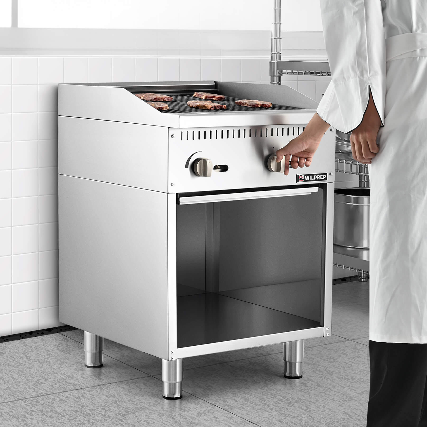 A 24-inch Wilprep comercial natural gas charbroiler with two burners, reversible grates, and a storage base beneath, presented in a stainless steel finish.