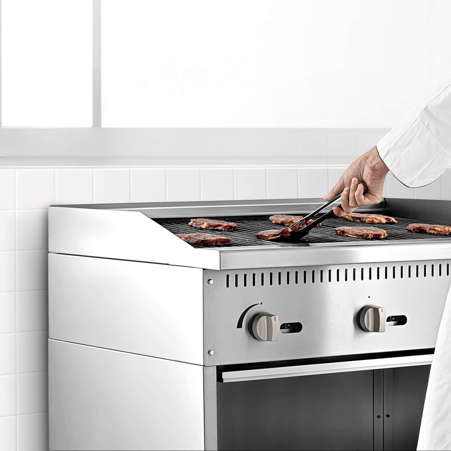 A 36-inch Wilprep charbroiler with three burners and a storage base, featuring stainless steel construction with a black handle and control 
