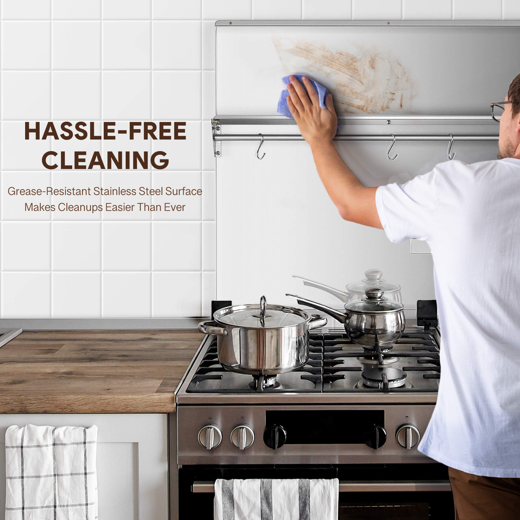 A 36x30 stainless steel backsplash with a magnetic knife rack and storage shelf attached to the wall.