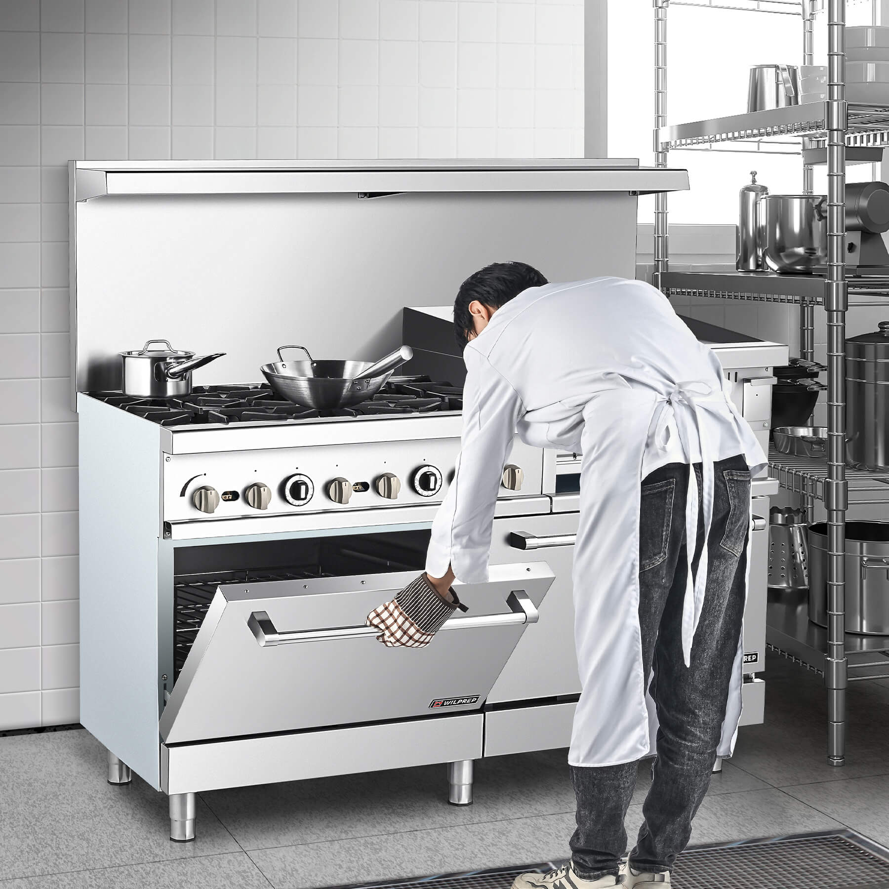 A commercial-grade stainless steel natural gas range with two ovens, a griddle broiler, and multiple burners.